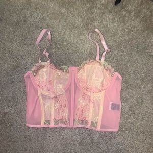 Pink corset top cropped with yellow lace